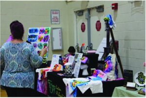 Vendor table with handmade goods at the Mandel JCC Jewbilee