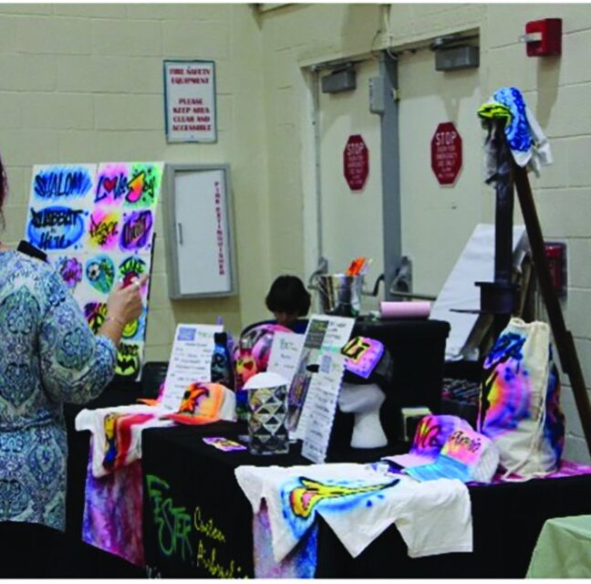 Vendor table with handmade goods at the Mandel JCC Jewbilee