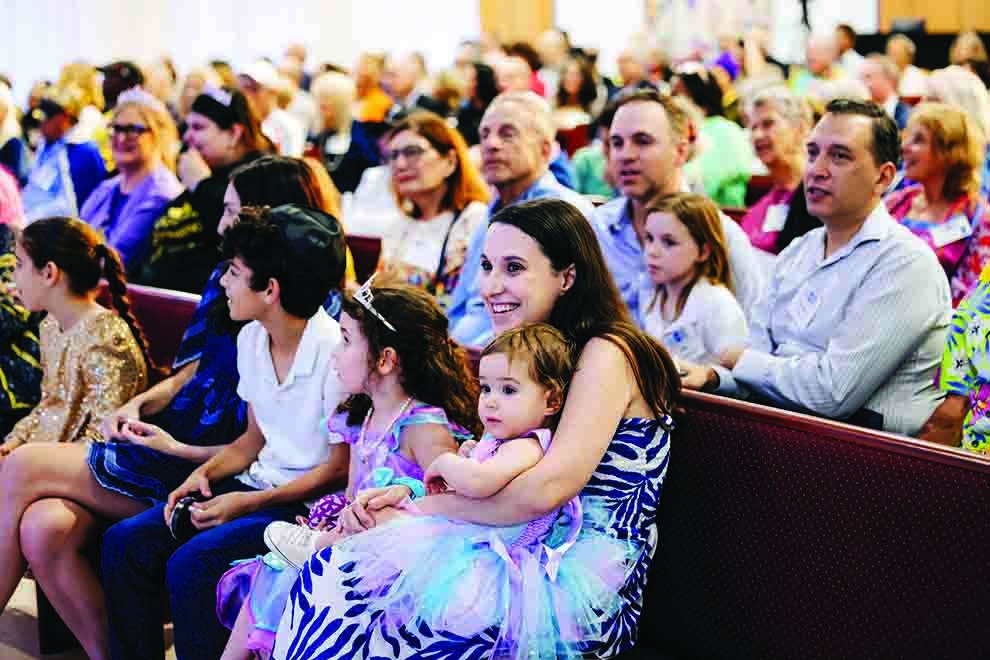 Families seated in the pews at Temple Israel’s new West Palm Beach campus