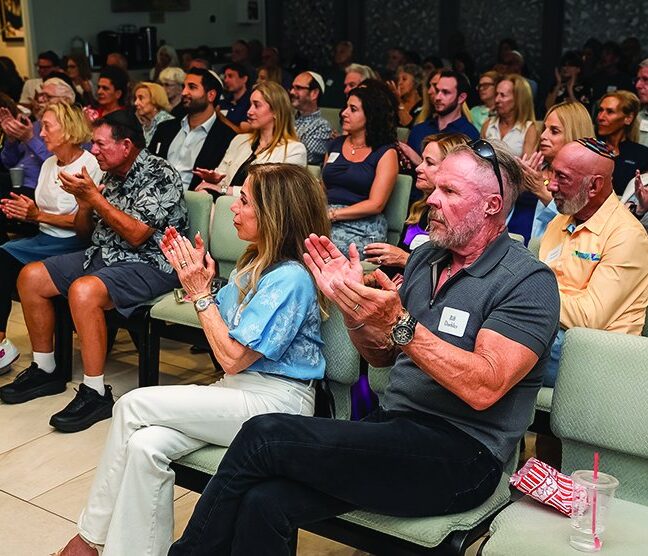Audience applauding during the screening of The Prophet at Chabad PBG