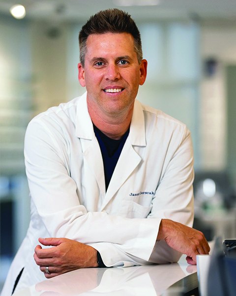 Dr. Jason Gorscak of See Vision Eye Institute in his white coat