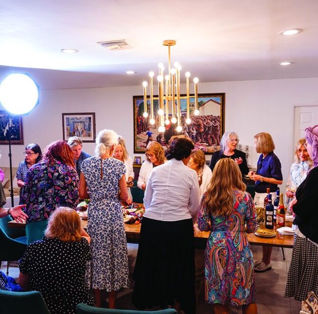 Women mingling at Rebbetzin Sara Krinsky's birthday gathering