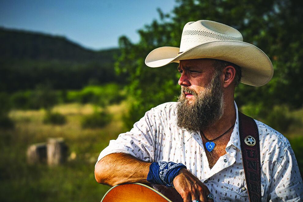 Joe Buchanan, Texas-born Jewish country music artist, with his guitar
